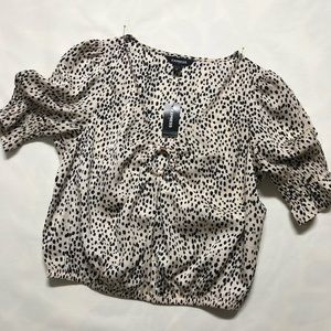 Express top cream and black animal print